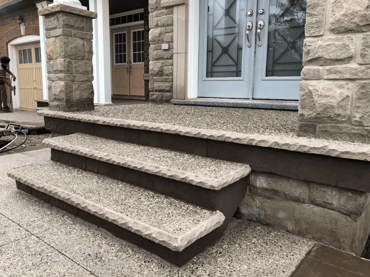 Exposed aggregate concrete steps and front landing