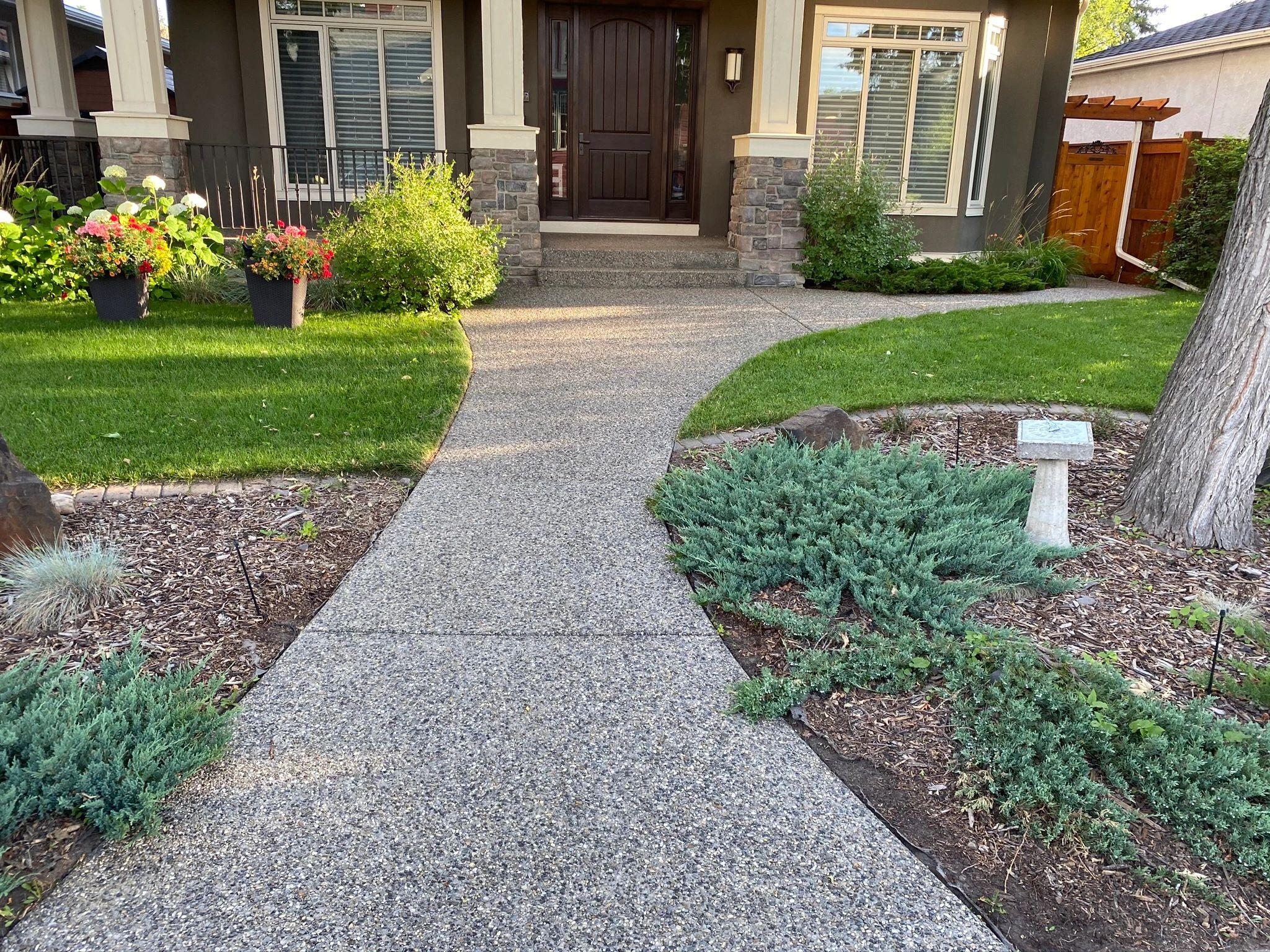 Exposed aggregate front walkway and entrance