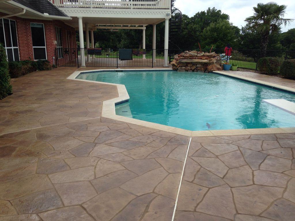 Stamped concrete swimming pool deck