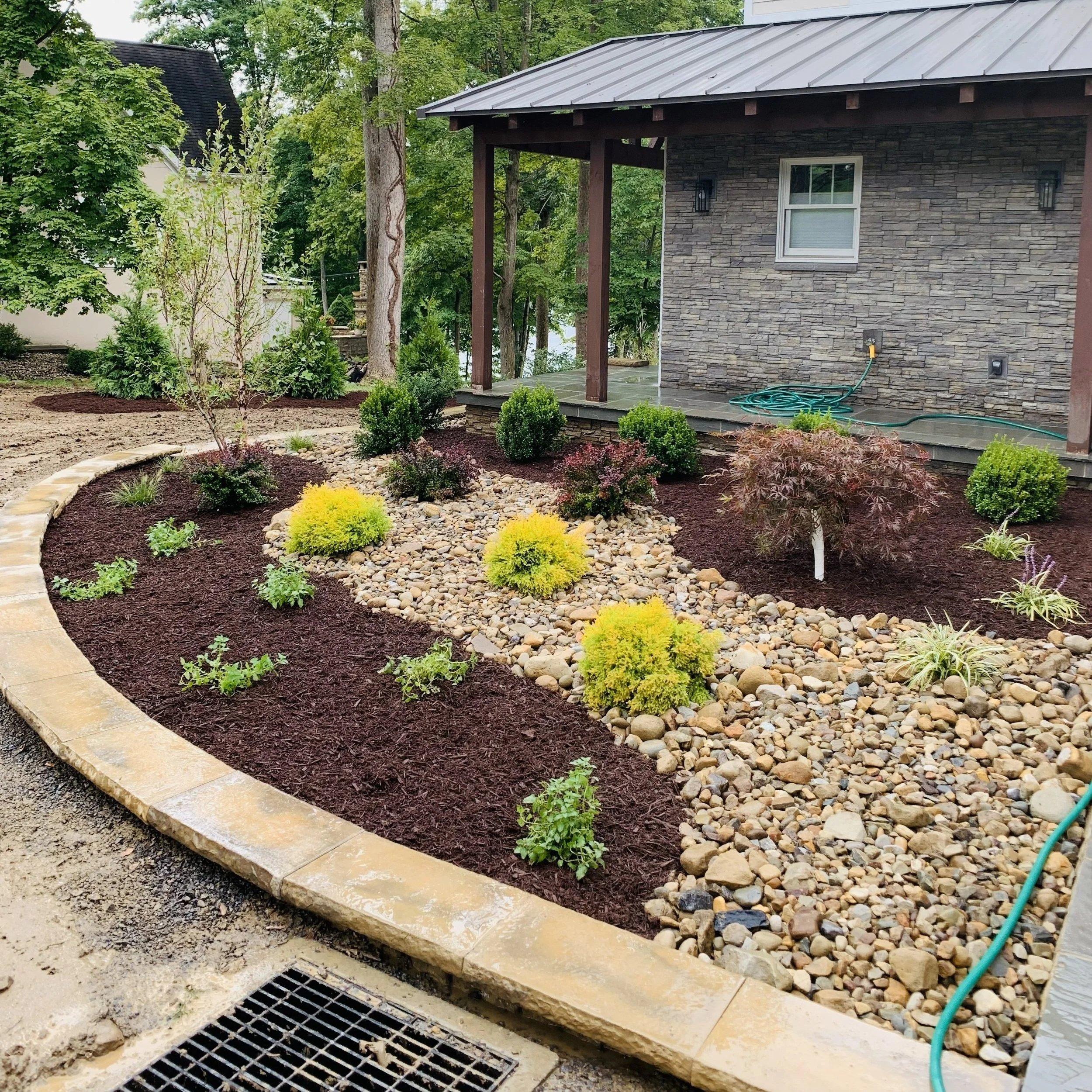 Residential trees shrubs and flower planting